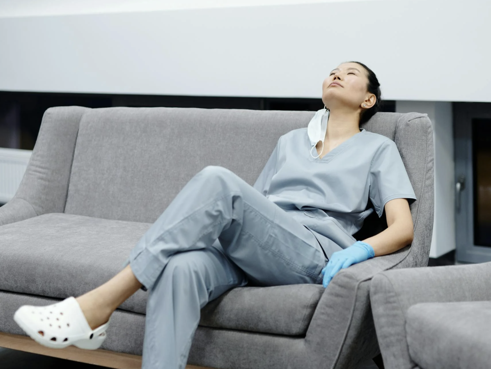 Doctor relaxing after efficient documentation with Maddie AI